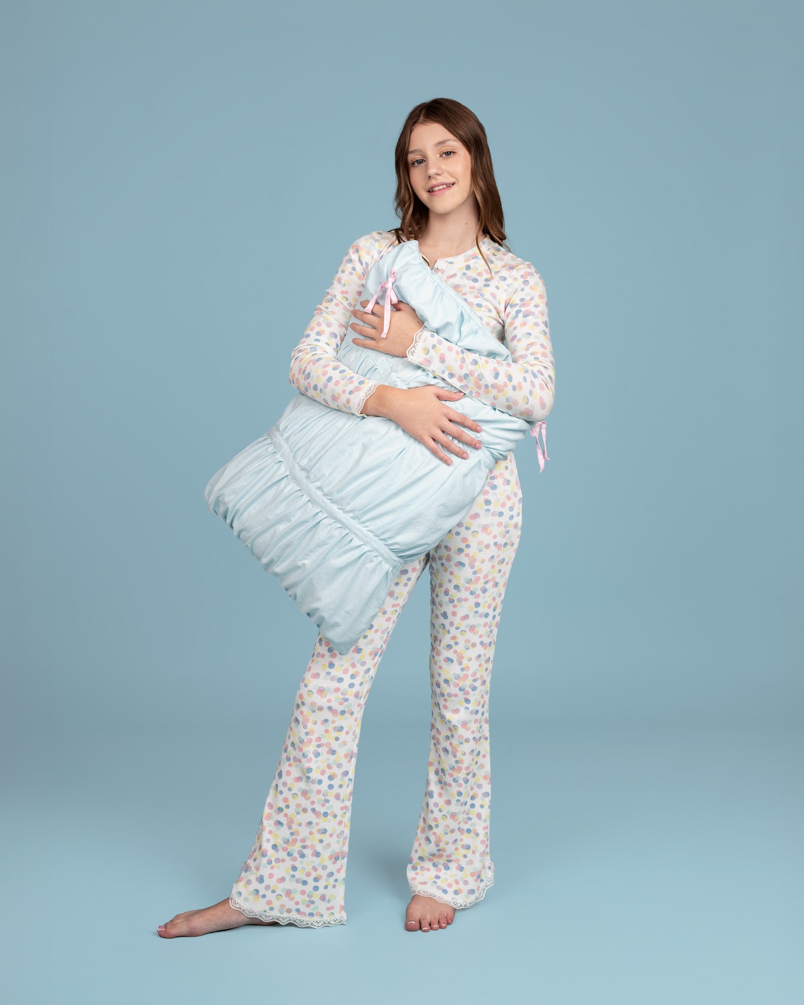 Teen model wearing Dream Queen Co. waffle top in pastel confetti crush, and waffle lounge pant in pastel confetti crush